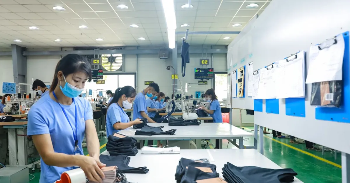 High-Performance Sportswear Manufacturer happy sewing workers